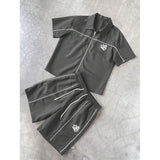 Striped Zip-front Short-sleeve Shirt And Shorts Set
