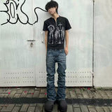 Distressed Slightly Flared Slim-fit Denim Jeans
