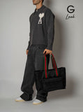 Gucci Men Black Tote Bag With Web Handles And Logo Lettering On The Front In Tech Fabric Man