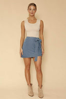 Asymmetrical denim bow skirt