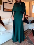 A Sleek Solid-color Satin Dress With Smooth Lines