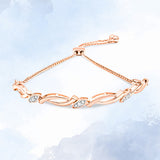 14K Rose Gold Plated .925 Sterling Silver 1/10 Cttw Diamond Alternating Swirl link Bolo Bracelet (I-J Color, I2-I3 Clarity) - 6" to 9" Adjustable