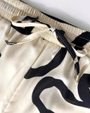 CHICME Women's 2 Piece Outfits 2025 Abstract Print Batwing Sleeve V Neck Top with High Slit and Loose Wide Leg Pants Set