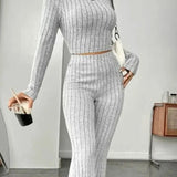Stand Collar Navel T-shirt and Trumpet pants