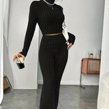 Stand Collar Navel T-shirt and Trumpet pants