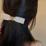 French Hepburn style versatile commuting texture silk black bow hair clip high-end spring clip hair accessory headwear