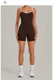 New Tight One-piece Yoga Suit Women Color Contrast Splicing Hollow Back Cross Sports Jumpsuit Outwear Slimming Fitness Bodysuits