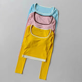 Autumn New Contrasting Yoga Suit for Women with Chest Pad Top Slim and Slim Pilates Running Sports Fitness Long Sleeves Shirts