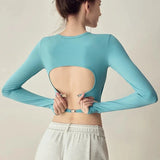 Women's long sleeved yoga suit sports top, high-end tight fitting hollow back fixed chest cushion