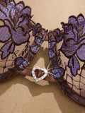 A limited edition brown and purple lace lingerie set with rose embroidery, see-through netting bra, and tie-up thong ZA825200