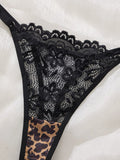 A Set of Black Sexy Lingerie, Featuring Leopard Print and Floral Patterns. The Lace Design Combines Charm with Sexiness ZA825182
