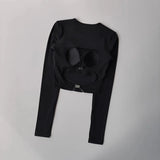 Women's long sleeved yoga suit sports top, high-end tight fitting hollow back fixed chest cushion