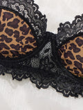 A Set of Black Sexy Lingerie, Featuring Leopard Print and Floral Patterns. The Lace Design Combines Charm with Sexiness ZA825182