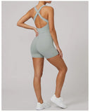 Cross Exposed Back Shaping Nude Yoga Jumpsuit Women Summer Sleeveless Pleate Slim Hip Lifting Short Sport Fitness One Piece Suit