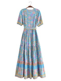Foridol Single Breasted Bohemian Holiday Summer Women Dress Belt Casual Loose Maxi Floral Dress Short Sleeve Long Viscose Dress