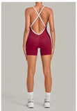 New Tight One-piece Yoga Suit Women Color Contrast Splicing Hollow Back Cross Sports Jumpsuit Outwear Slimming Fitness Bodysuits