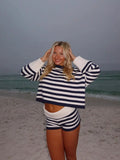 Women's spring suit 2026 European and American spring and summer women's fashionable lady solid color sweater short skirt suit