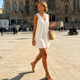 Women's Sleeveless White Mini Dress Floral Lace V Neck Summer Fashionable Solid Color Loose Fit Dress for Beach Vacations