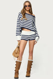 Women's spring suit 2026 European and American spring and summer women's fashionable lady solid color sweater short skirt suit