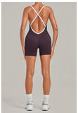 New Tight One-piece Yoga Suit Women Color Contrast Splicing Hollow Back Cross Sports Jumpsuit Outwear Slimming Fitness Bodysuits
