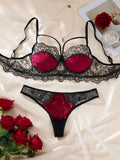 Sexy lingerie with floral see-through bra.The allure of a lingerie set for Valentine's night. BlackRed bra panties set ZA825166