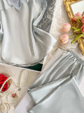 Two Piece Women's Pajamas Set with V Neck Lace Design Top Long Pants Fashionable And Comfortable For Spring And Summer Seasons