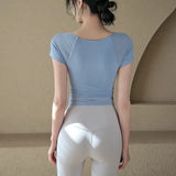 Women's yoga fitness short sleeved T-shirt, fixed chest cushion mesh fake two-piece yoga training fitness top