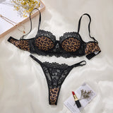 A Set of Black Sexy Lingerie, Featuring Leopard Print and Floral Patterns. The Lace Design Combines Charm with Sexiness ZA825182