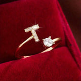 Adjustable Copper Initial Ring with Four-Claw Round Zirconia