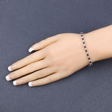 6.87 ct. t.w. Blue Sapphire and White Topaz Bracelet in Sterling Silver