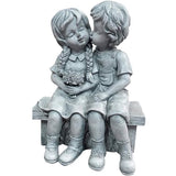 Boy Kissing Girl Statue Sitting on Bench Figurine
