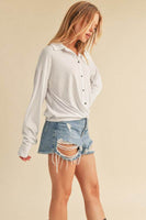 Aemi + Co Twisted Hemline Button Detail Collared Neck Top
