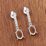 0.14 Carat Genuine White Diamond 14K White Gold Semi Mount Earrings - holds 7x5mm Oval Gemstones
