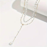 Elegant Vintage Style Double-Layer Pendant Necklace with Imitation Pearl Accents and Tassel Drop