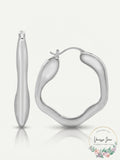 And Now This Silver Plated Wave Look Click Top Earrings