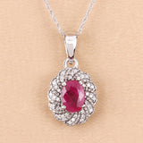 0.95 Carat Genuine Ruby and White Diamond 10K White Gold Pendant