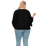 Solid Top Featuring Flattering Wide Sleeves